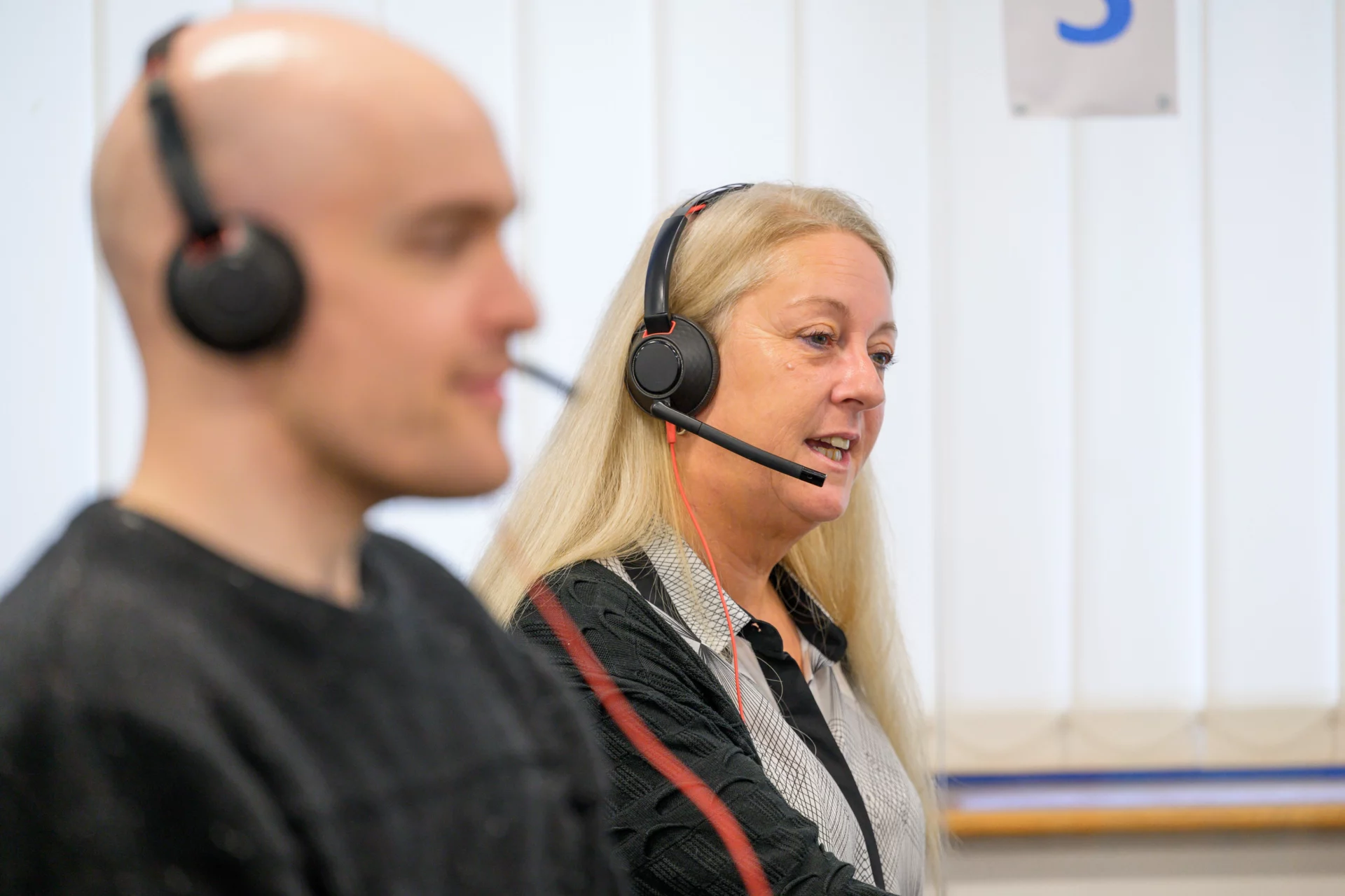 An MSI UK call agent wearing a headset.