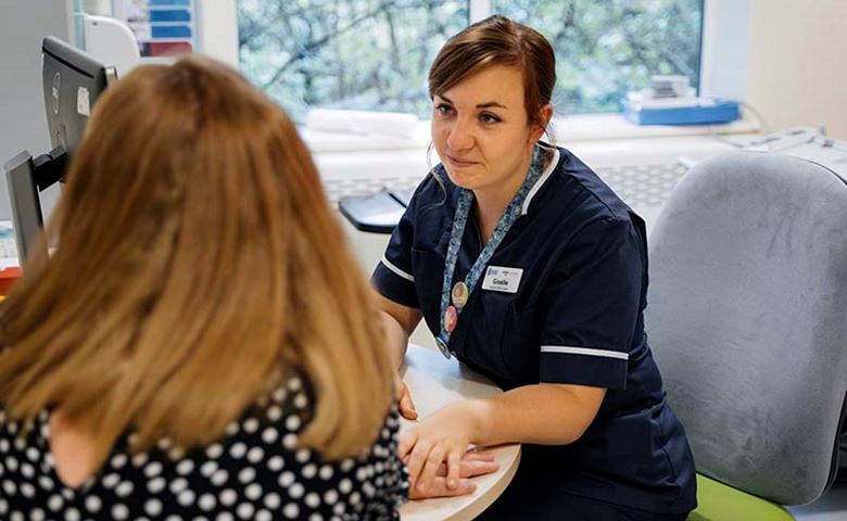 MSI UK nurse comforting abortion client.