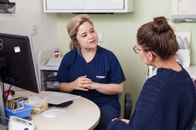 MSI UK nurse having consultation with client.