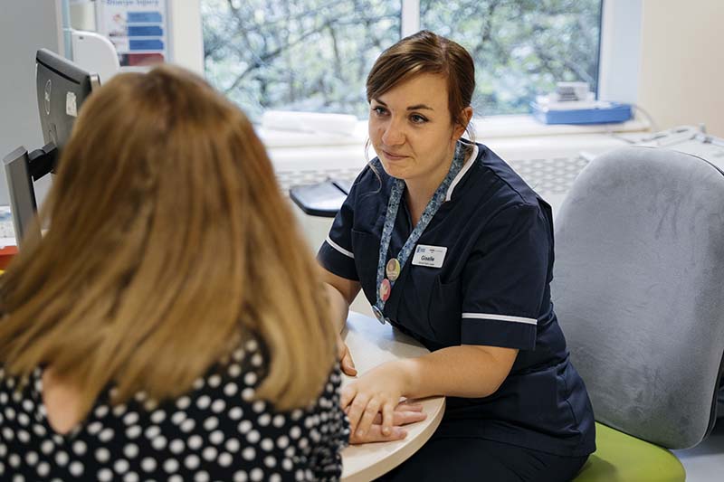 MSI UK nurse comforting abortion client.